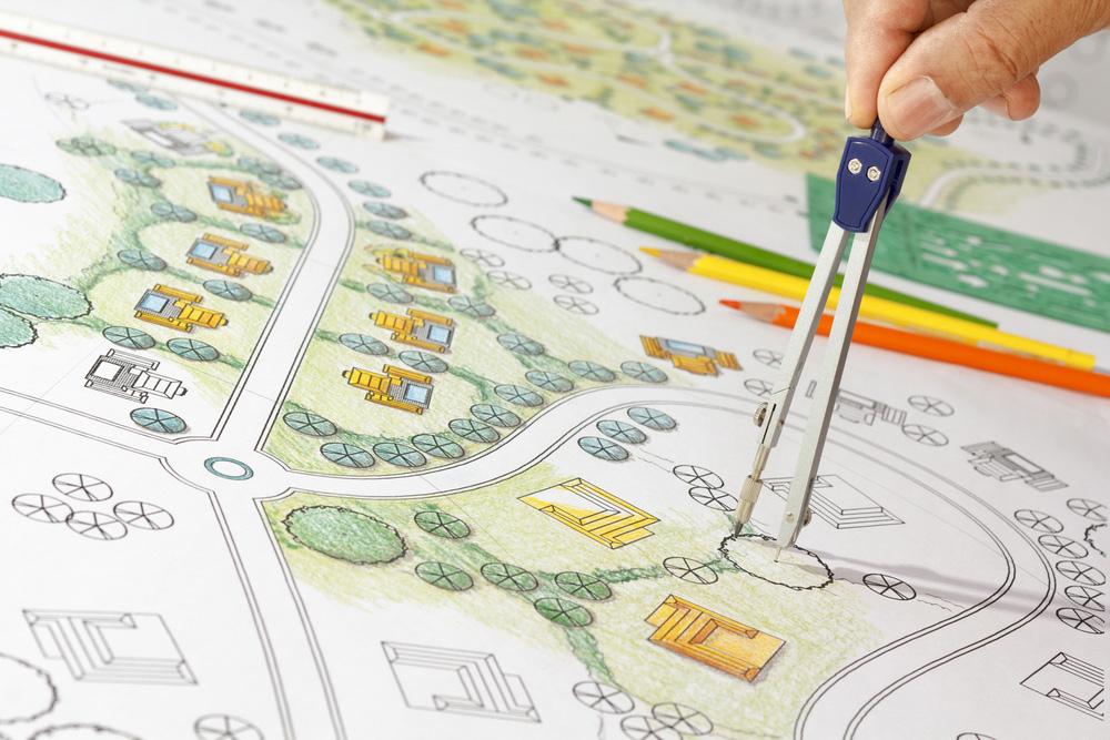 map with hand tool